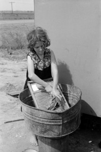 Russell Lee - Twelve-year-old girl who keeps house in a trailer for her three brothers who are migrant workers, near Harlingen, Texas, 1939